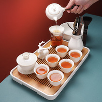 Kung Fu tea set for making tea Household living room ceramic teapot Teacup White porcelain sheep fat jade cover bowl Tea tray Small