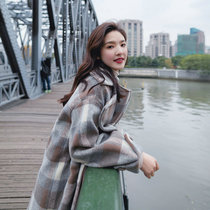 European station 2021 autumn and winter New plaid coat female Korean temperament long loose big pocket woolen coat