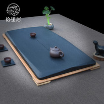 Shiliju whole block black gold stone retro tea plate stone head tea table handmade household simple black stone drainage tea Cheng tea sea