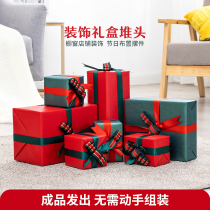 Christmas gift box pile head Hotel shopping mall window decoration Christmas scene New year layout Spring Festival window props