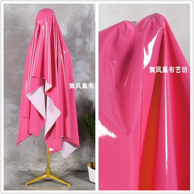 taobao agent Super bright pink rose red mirror bright surface soft high -elastic reflective reflective leather imitation leather clothing fabric