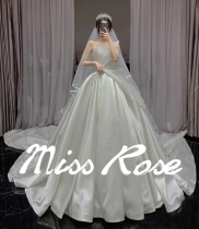 Wedding dress 2021 new bride French satin chest master wedding dress long tailed puffy dress white Korean version of Swan