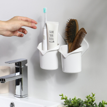 Bathroom hanging toothbrush holder Wall-mounted punch-free bathroom storage suction cup Comb tube toothpaste cup tooth storage box