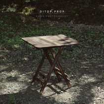 Old folding solid wood table photography background Old broken table Retro still life round dining table food photo props quaint country courtyard garden decoration wooden board dark tone literary style old wooden board
