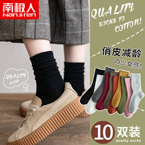 Spring and autumn pile socks ladies middle tube black and white jk solid color thin summer long tube sports cotton ins tide