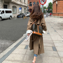 Korean version of chic temperament windbreaker women long 2022 Spring and Autumn New loose waist design feel turned sleeve jacket