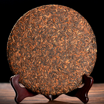 2015 Yi Wu ancient tree golden Bud Yunnan Puer tea cooked tea seven seeds cake tea Puer ripe tea head Spring Puer tea cake