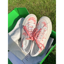 2021 summer new Korean version of the wild niche canvas shoes net red graffiti student lace-up round head white shoes female