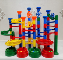 Play with music childrens plastic pipes are mixed up puzzle track big particle ball block toy