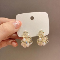 Korean temperament simple flower pearl stud earrings female 2021 New Tide senior sense light luxury diamond earrings earrings