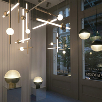 Nordic light luxury horizontal vertical line chandelier postmodern model house exhibition hall restaurant minimalist metal luminous glass ball light