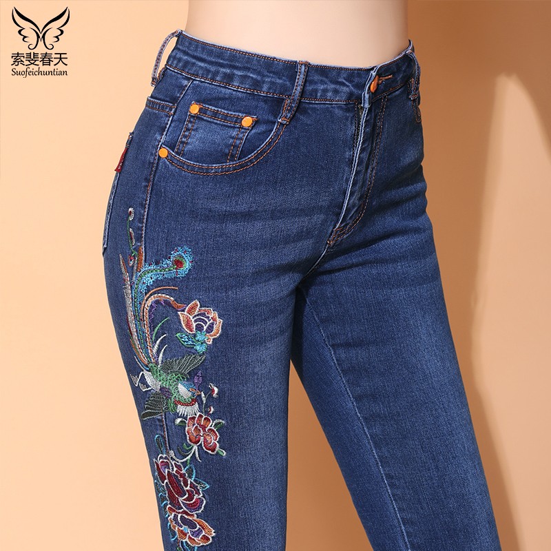 National wind jeans womens 2021 spring embroidered high-waisted loose-legged large size elastic micro-horn embroidered trousers