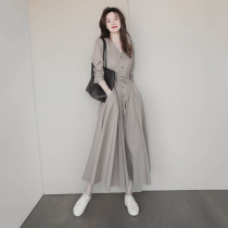 European station autumn new French high sense of light and mature wind temperament waist long skirt long sleeves gray dress woman