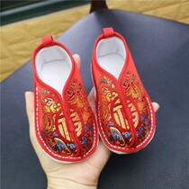 Male and female baby 100 days to catch Zhou Tang suit shoes New Years blessing shoes thousand layer bottom baby cloth shoes baby handmade cloth shoes Spring