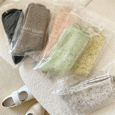 taobao agent Demi-season warm woolen Japanese creamy socks, mid-length