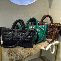 Tote down bag women's large capacity 2021 new short-distance travel bag texture small group shoulder slung portable women's bag