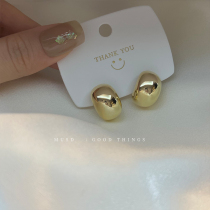 Simple temperament golden earrings niche design sense high-end earrings metal earrings no ear holes mosquito coil ear clip female