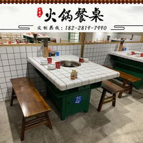There is a hot pot table marble induction cooker integrated smokeless commercial hot pot table solid wood hot pot table and chair combination