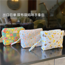 Japanese order baby diaper bag hand-carried cart diaper diaper storage bottle hanging bag