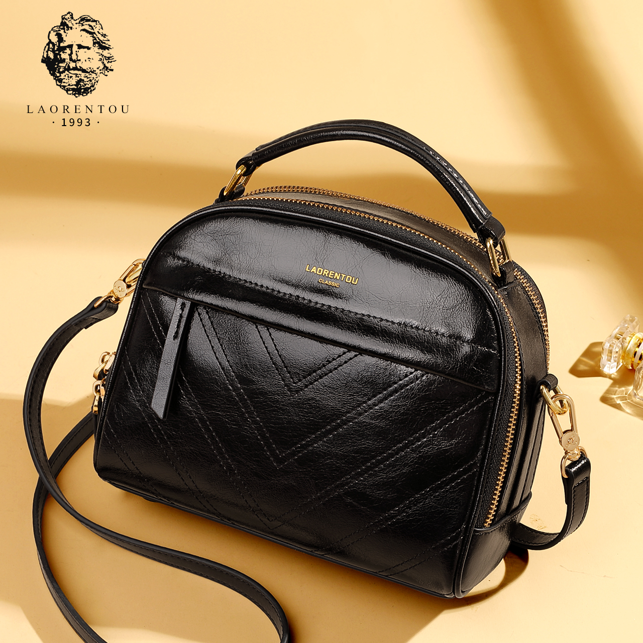 Old lady's handbag and lady's new style of Baitao leather leisure temperament in 2019
