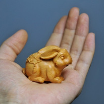 Cliff - wood carving hands a 2023 rabbit mascot for the birth of the twelve zodiac rabbit
