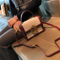 Hong Kong new cowhide womens bag medium-sized handbag Fashion all-in-one portable oblique cross shoulder bag Pet backpack