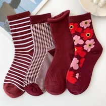 Red socks womens midline socks ins tide autumn and winter long Korean cute Japanese striped curly red stockings