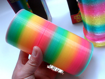 Large rainbow ring Magic plastic stacking ring Spring ring toy elastic pull ring Adult childrens game