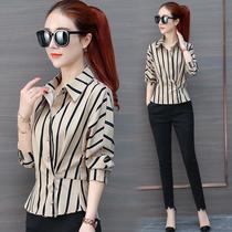Striped shirt womens autumn 2020 new skirt small shirt Western style waist long-sleeved top shirt design sense niche