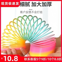 Childrens Magic Rainbow Circle Tower educational toy stacked music luminous elastic pull ring male girl gift colorful professional