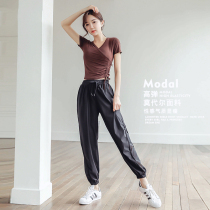 Yoga womens short sleeve suit loose beam feet beautiful back net red sexy fashion outdoor morning running high-end fitness clothes autumn