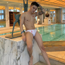 Sea anchor Jun swimming trunks mens triangle T-shaped sexy low waist navy bikini sun tanning mellow professional transparent