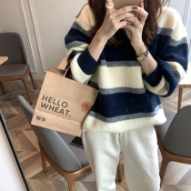 In 2021 the new thick knit sweater is set up in the retro color pattern loose lazy striped sweater womens autumn and winter wear tide