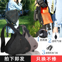 SLR camera bag portable micro single shoulder Canon Nikon Sony professional digital photography backpack light travel waterproof shockproof men and women sports leisure lens storage large capacity multi-function