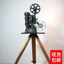 Nostalgic vintage movie machine Wrigley Arrow 16mm 16mm old film projector wooden tripod